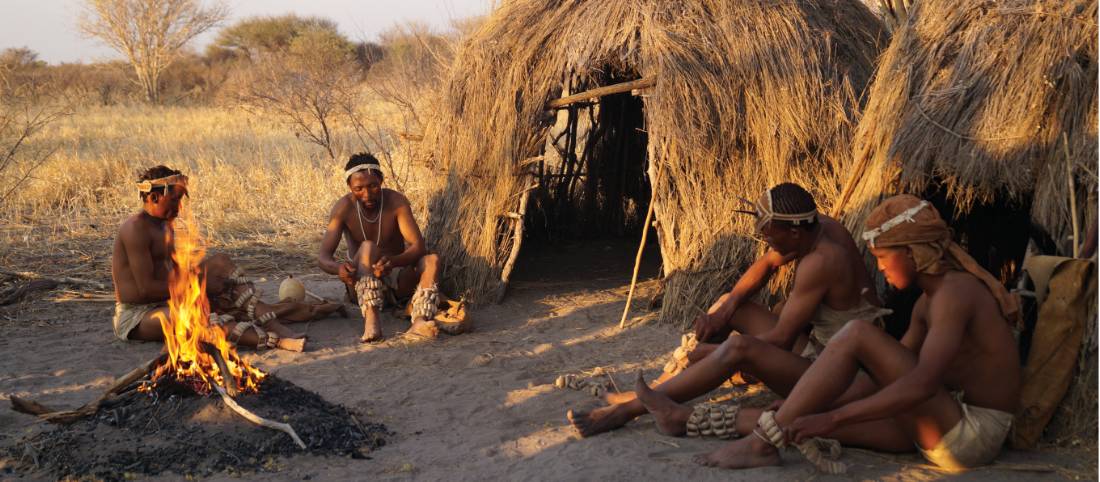 Local trackers preparing for a traditional Bushman dance around the campfire |  Ashley Hewson
