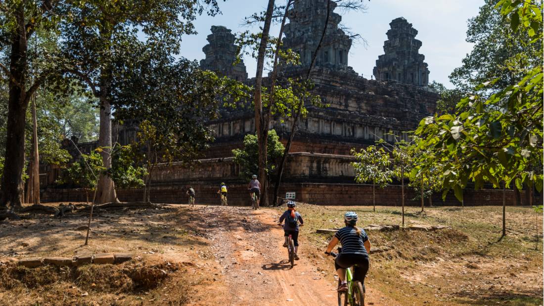 Exploring the ruins of Angkor Wat by bike is a unique way to discover the UNESCO listed site | <i>Lachlan Gardiner</i>