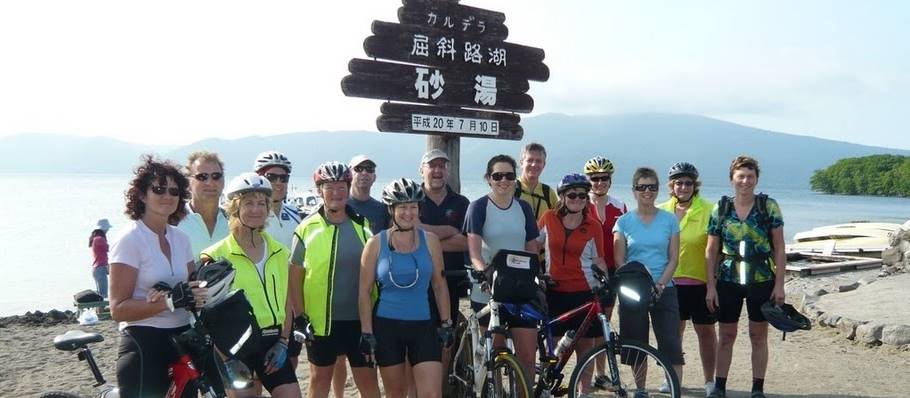 Resting the legs for a group photo in Hokkaido