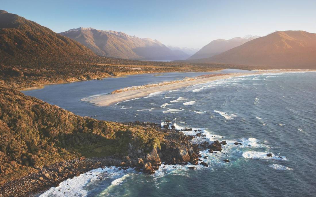 Aerial view over Long Reef and Martin's bay on the Fiordland, Hollyford and Stewart Island Trek | <i>Hollyford Track</i>