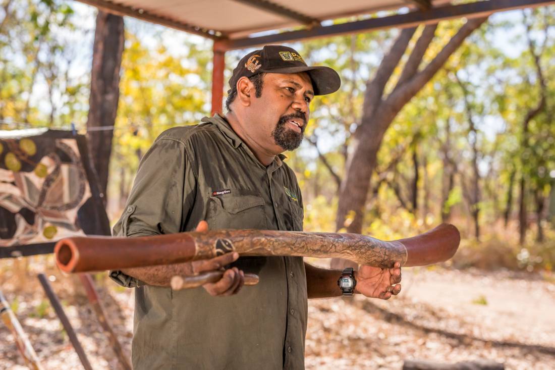 An Indigenous guide shares his knowledge of Aboriginal music during a cultural tour | <i>Tourism NT/Nick Pincott</i>
