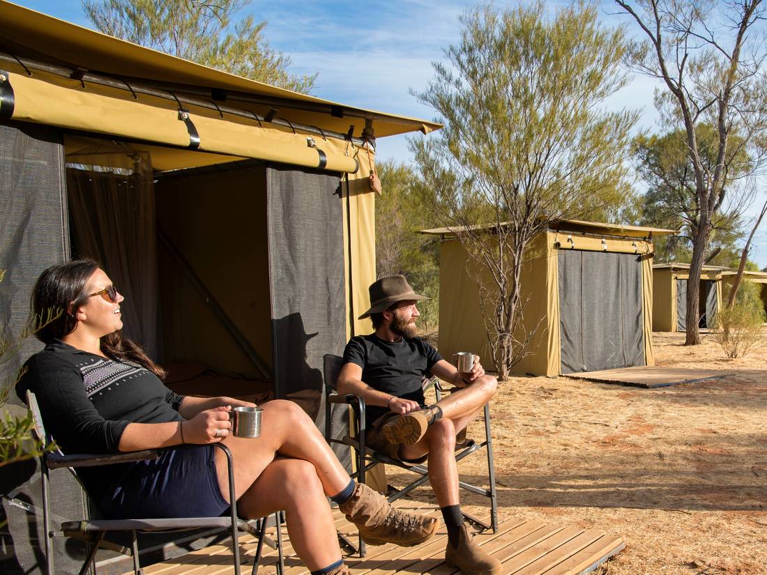 Trekkers relaxing on the porch of their campsites |  <i>Shaana McNaught</i>