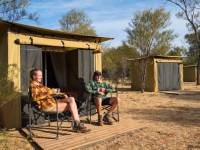 Trekkers relaxing on the porch of their campsites |  <i>Shaana McNaught</i>