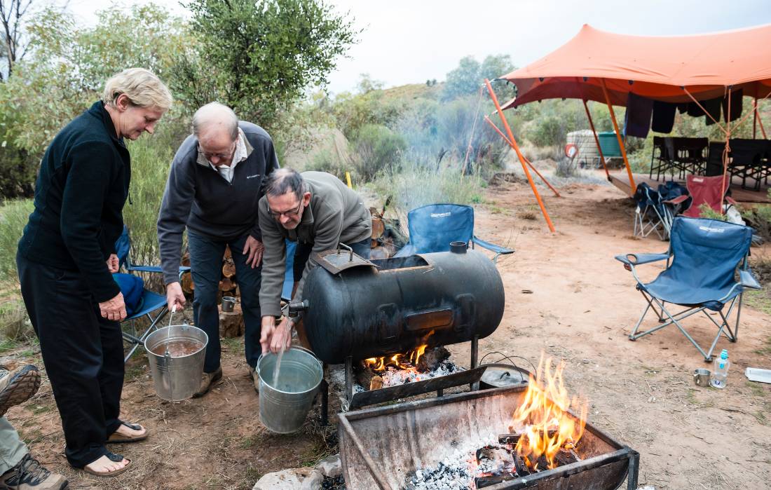 Heating up some water at camp |  <i>Caroline Crick</i>
