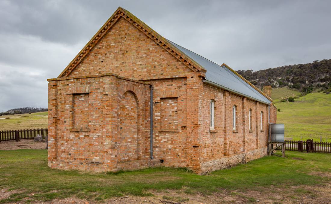 The graveyard near Wybalenna Chapel contains unmarked Aboriginal graves. Around 300 Aboriginals were ‘delivered’ there during its time as a mission. | <i>Dietmar Kahles</i>