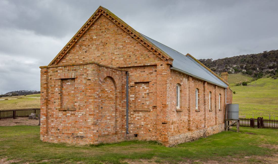 The graveyard near Wybalenna Chapel contains unmarked Aboriginal graves. Around 300 Aboriginals were ‘delivered’ there during its time as a mission. | <i>Dietmar Kahles</i>