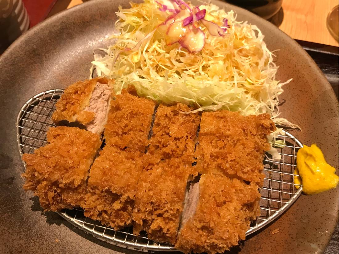 Japanese pork katsu, served with shredded cabbage. |  <i>Ben Groundwater</i>