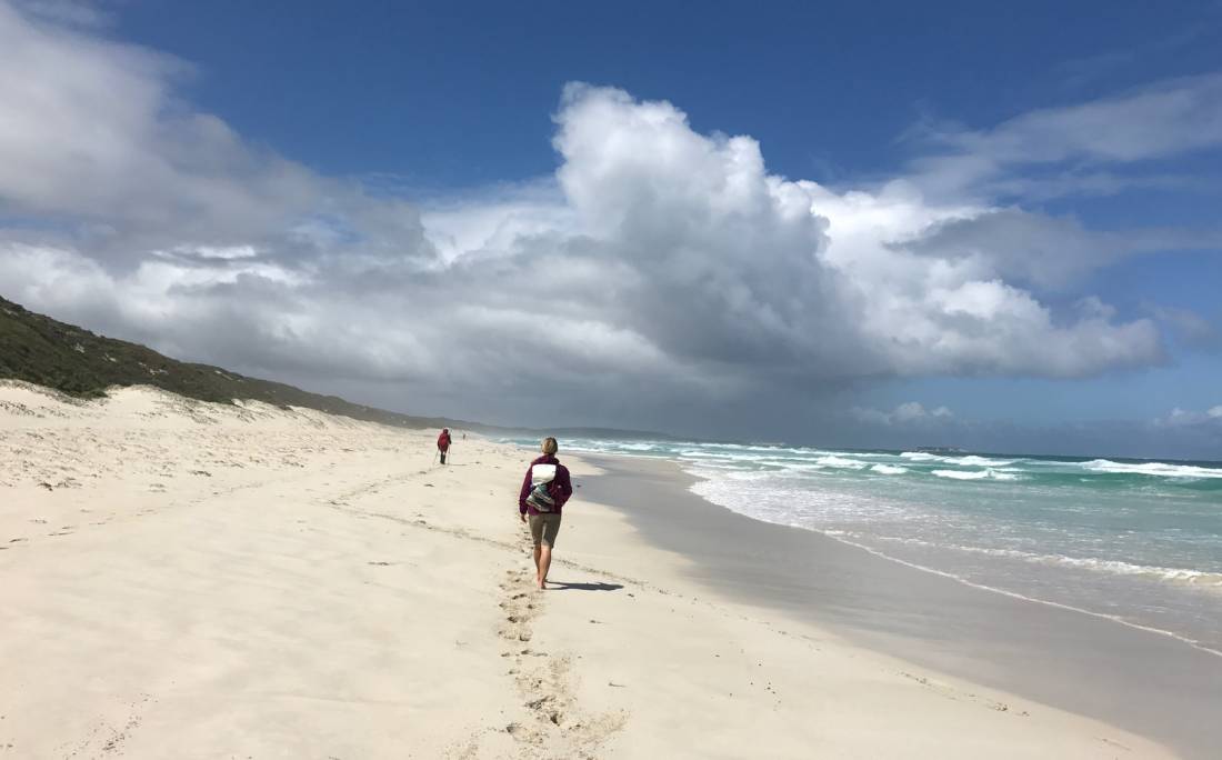 Enjoying a barefoot walk along the beaches on the Cape to Cape Track | <i>Catriona Sutherland</i>