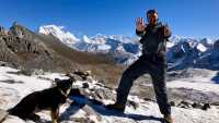 A happy trekker on the Karakachu La (5020m) pass in Bhutan | Matt Brazier