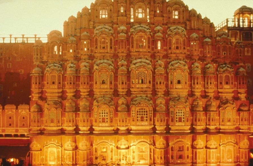 The Palace of Winds in Jaipur is located in the city and is a stunning example of Rajput architecture and artistry with its pink delicately honeycombed 953 sandstone windows known as 'jharokhas' | <i>Fiona Windon</i>
