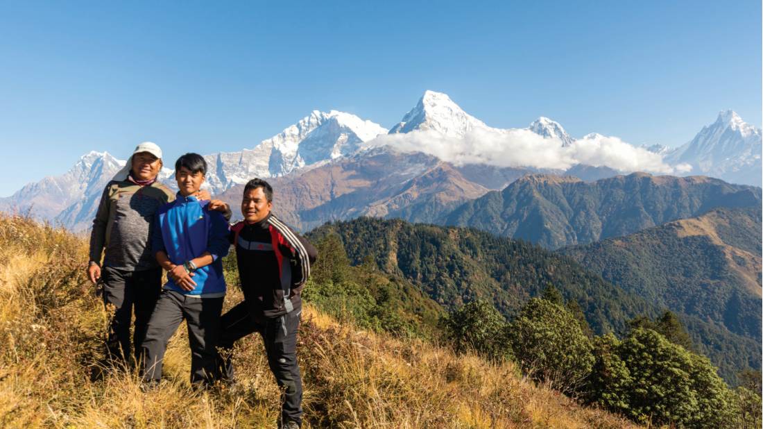 Our porters Rinzin, Ujaal and Santosh pause for a photo | <i>Joe Kennedy</i>