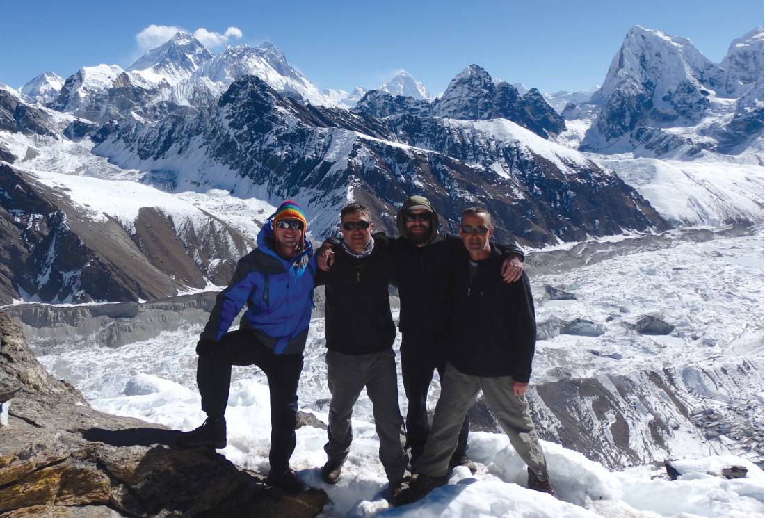 Happy trekkers atop of Gokyo Ri, Nepal | <i>Scott Cardwell</i>