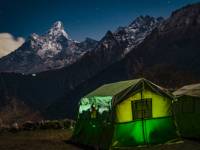 Kyangjuma camp at night with Ama Dablam in the distance |  <i>Tim Charody</i>