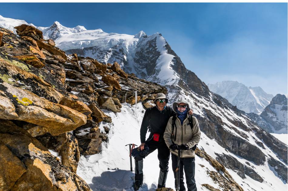 Trekkers climbing beautiful mountains in Nepal | <i>Lachlan Gardiner</i>