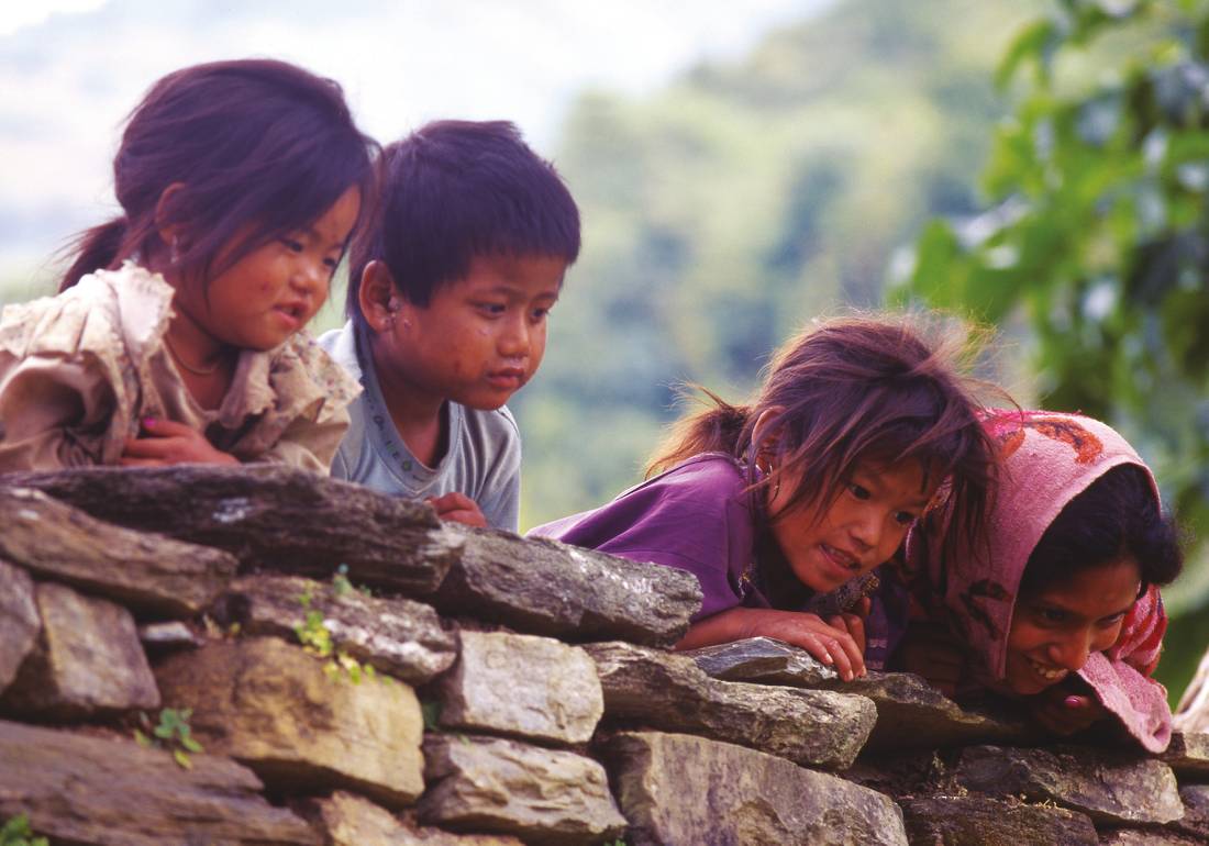 Whilst trekking through the small Hindu villages in the Annapurnas you will be met by the enthusiastic greetings of the Nepali children | <i>David Tatnall</i>
