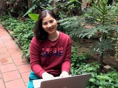 Ms Thuan in her garden