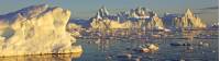 Midnight sun illuminates Icebergs near Ilulissat off the coast of Greenland