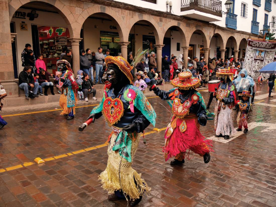 Local enjoying Inti Raymi Festival in the streets of Cusco | <i>Heike Krumm</i>
