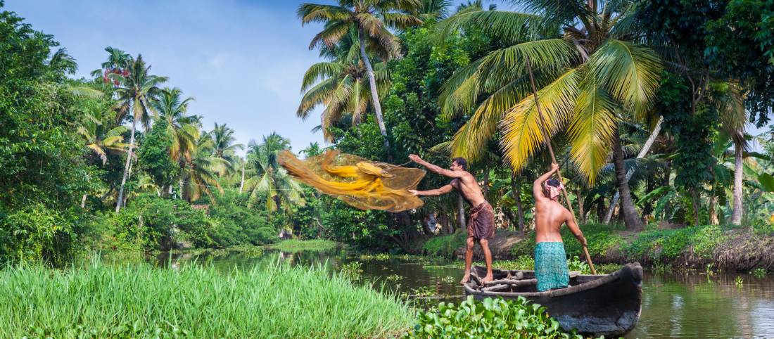 Villagers fishing in the backwaters near Kerala | Richard I'Anson